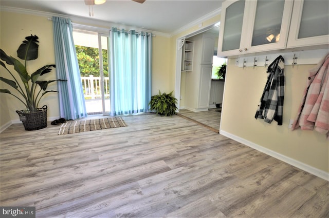 mudroom with crown molding, ceiling fan, and light wood-type flooring