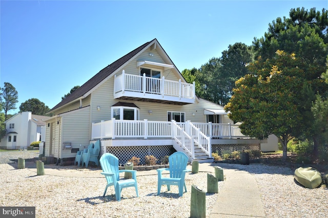 rear view of house with a deck