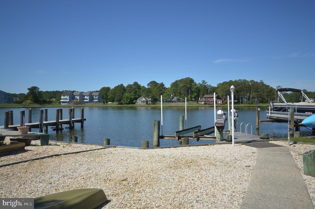 view of dock with a water view