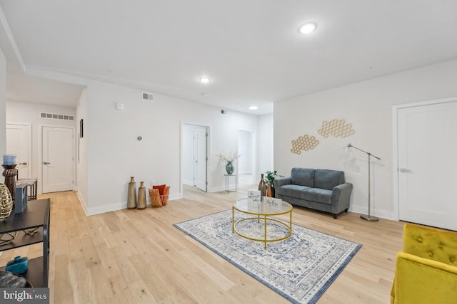 living room with hardwood / wood-style flooring