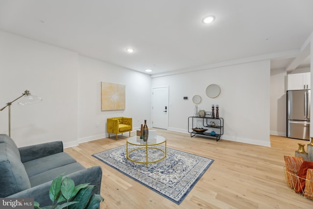 living room featuring light wood-type flooring