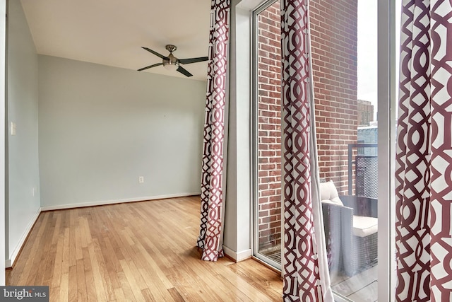 interior space featuring ceiling fan and light hardwood / wood-style floors