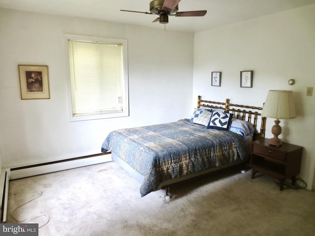 bedroom featuring carpet, ceiling fan, and baseboard heating