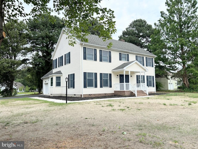 colonial-style house with a garage