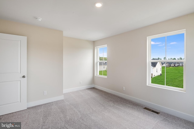 view of carpeted spare room