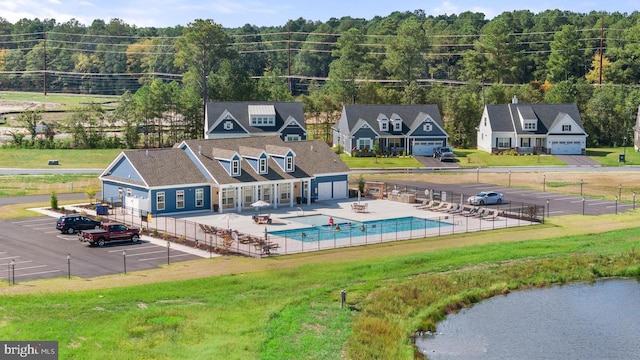 drone / aerial view featuring a water view