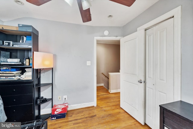 interior space with ceiling fan and light hardwood / wood-style flooring