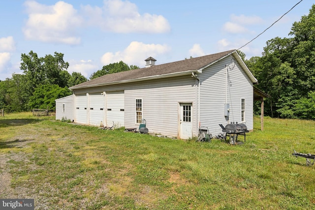 view of property exterior featuring a yard