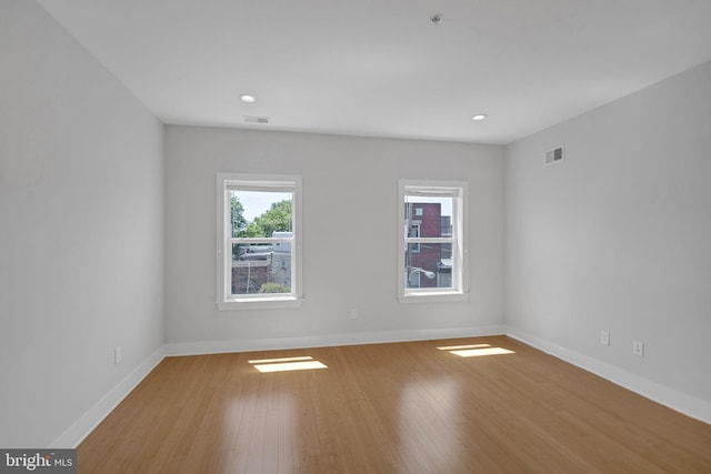 empty room featuring light hardwood / wood-style floors