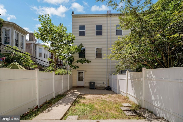 exterior space featuring a patio and central AC