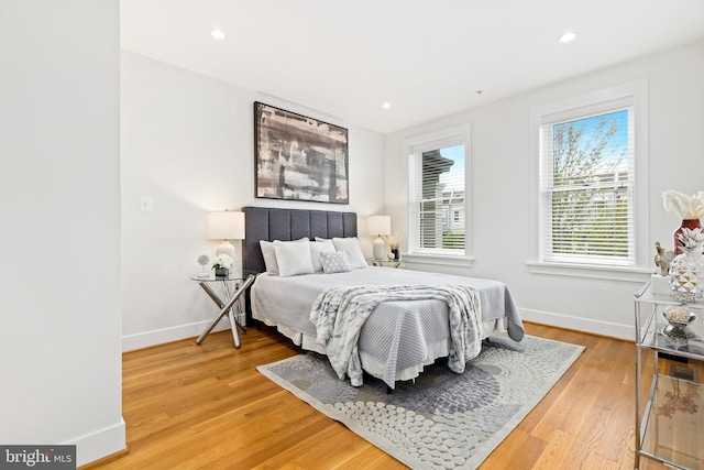 bedroom with wood-type flooring