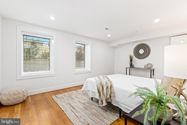 bedroom featuring light hardwood / wood-style floors