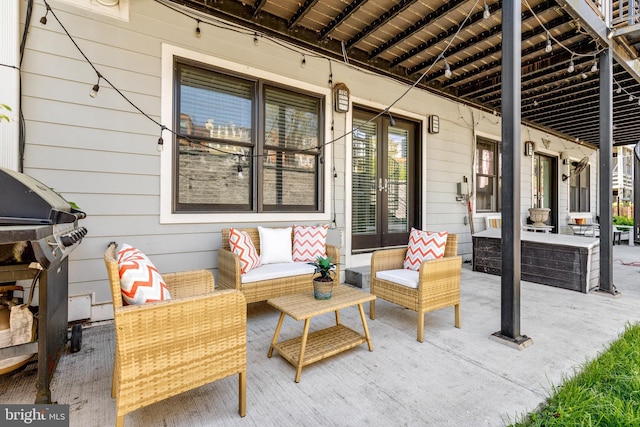 view of patio with a grill and french doors