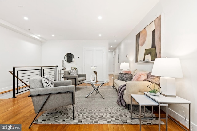 living room with light hardwood / wood-style flooring