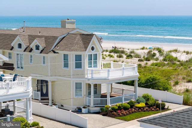 exterior space featuring a beach view