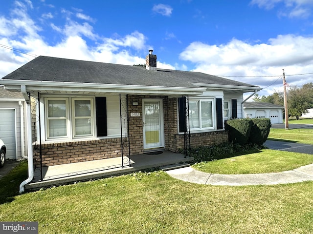 view of front of house featuring a front lawn and a porch