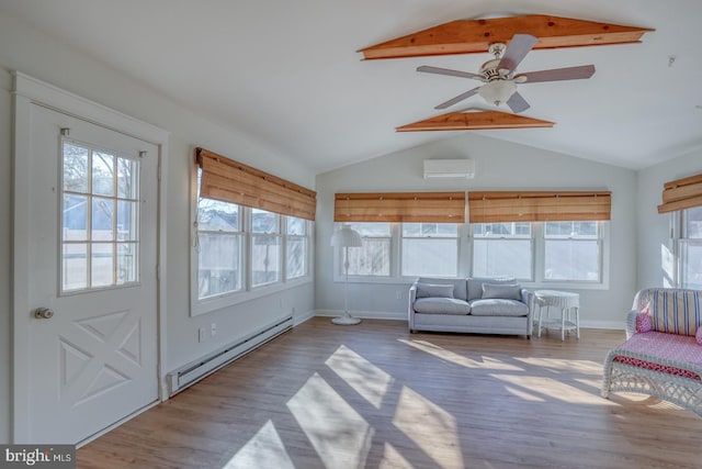 sunroom with a wall mounted AC, baseboard heating, a healthy amount of sunlight, and ceiling fan