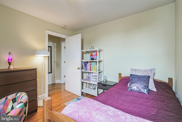 bedroom featuring wood-type flooring