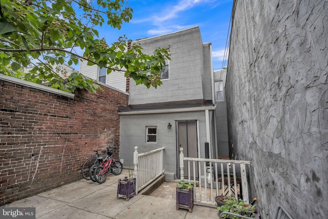 rear view of house with a patio area