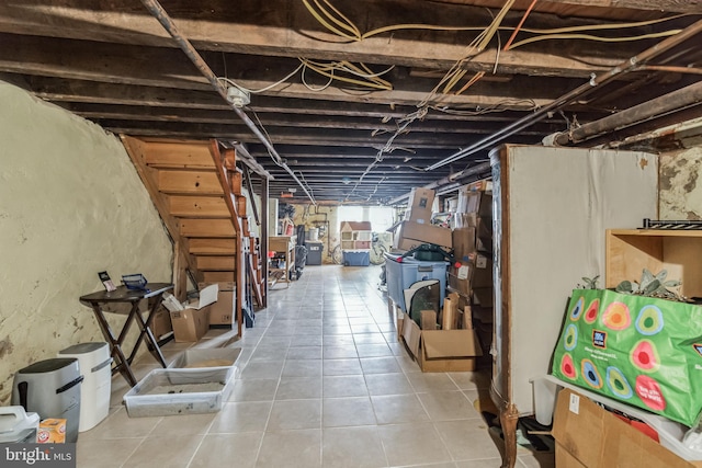 basement with tile patterned flooring