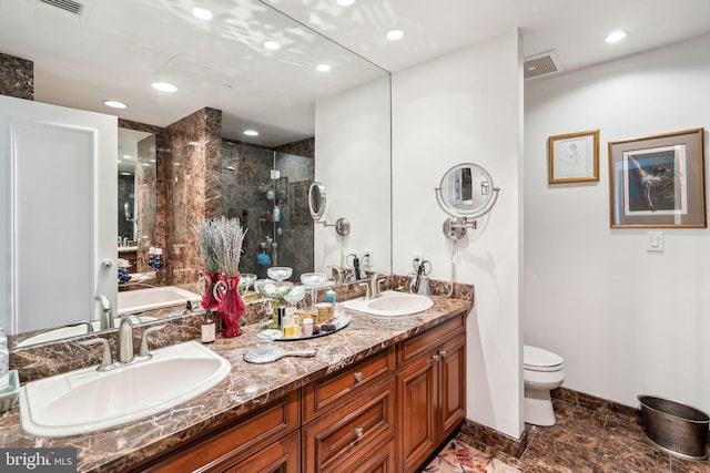 bathroom featuring vanity, an enclosed shower, and toilet