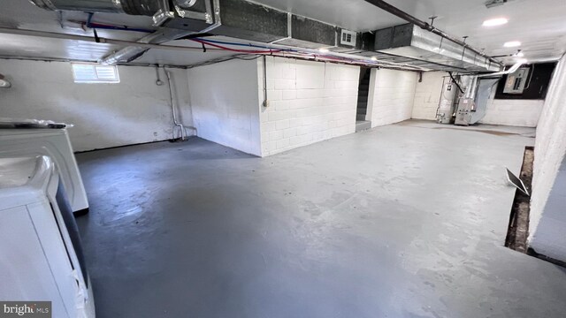 basement featuring washer / dryer and electric panel