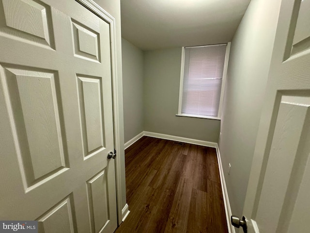 interior space with dark hardwood / wood-style floors