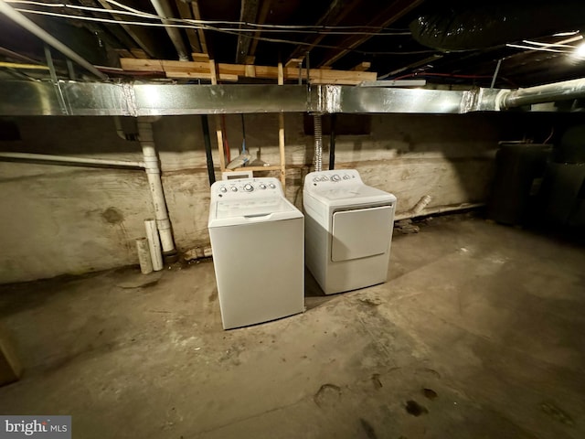 basement with washer and clothes dryer