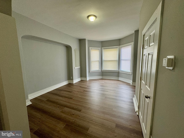 spare room with hardwood / wood-style flooring