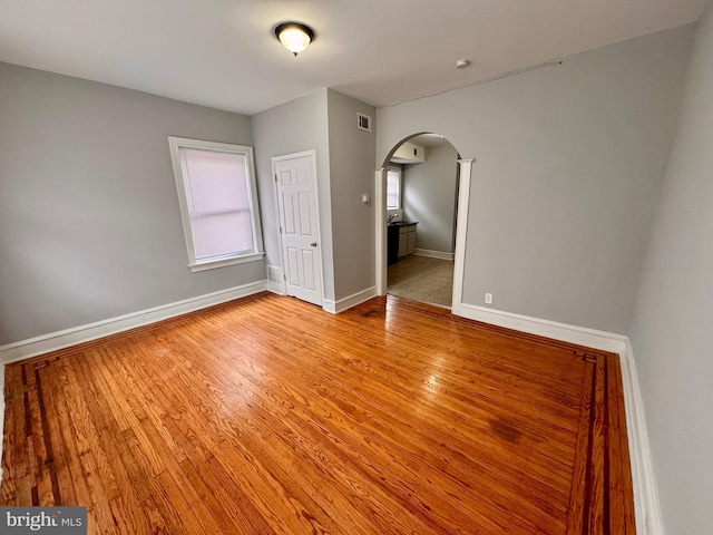 spare room with light hardwood / wood-style flooring