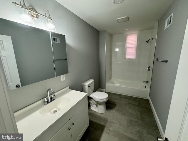 full bathroom with tiled shower / bath combo, toilet, and vanity