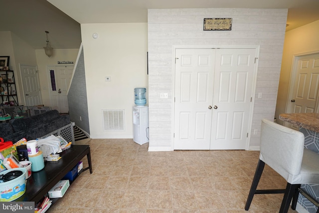 interior space featuring light tile patterned floors