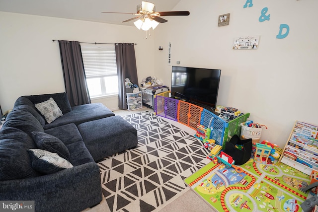 living room featuring ceiling fan and carpet flooring