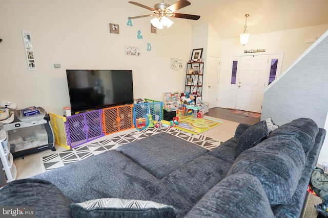 living room featuring carpet flooring and ceiling fan