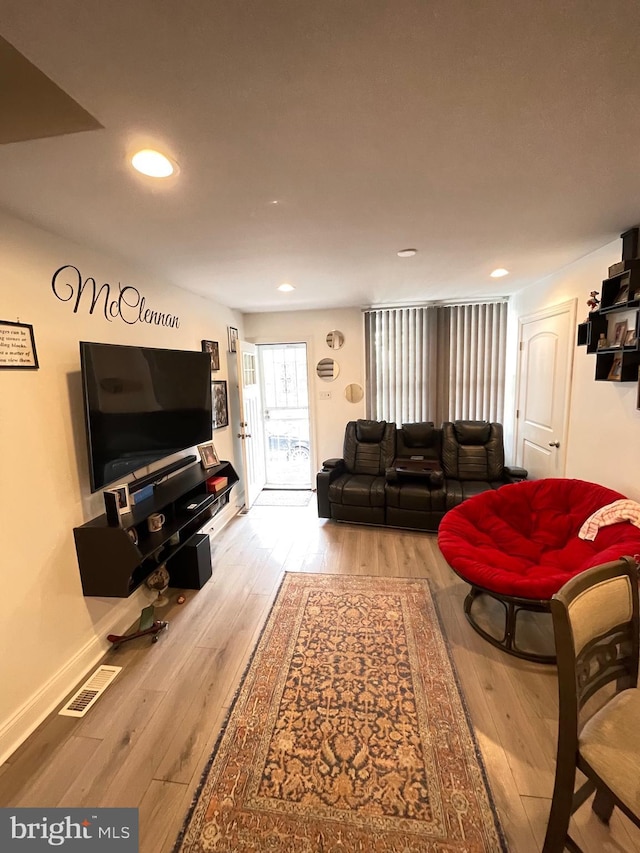 living room with hardwood / wood-style floors