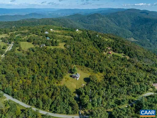 drone / aerial view featuring a mountain view