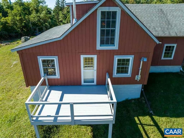 view of outbuilding with a lawn