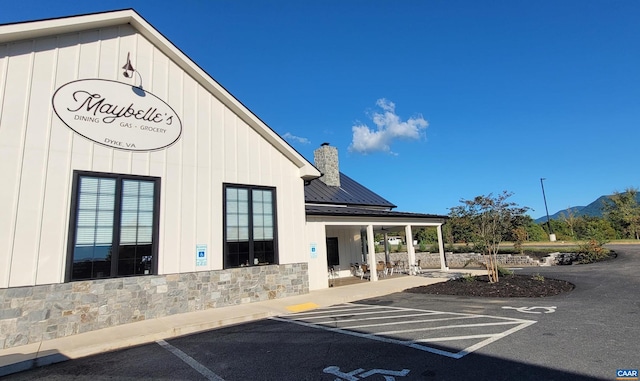 view of building exterior featuring a mountain view