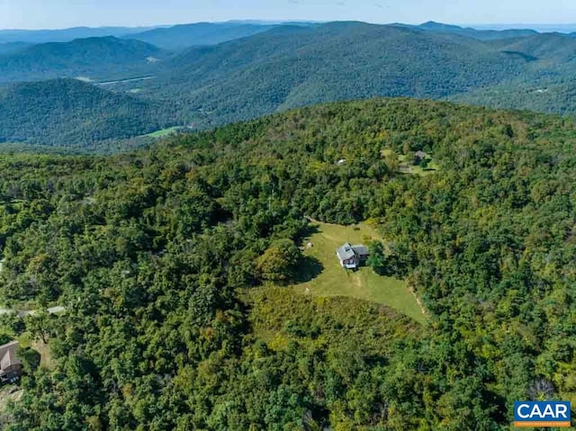 drone / aerial view featuring a mountain view