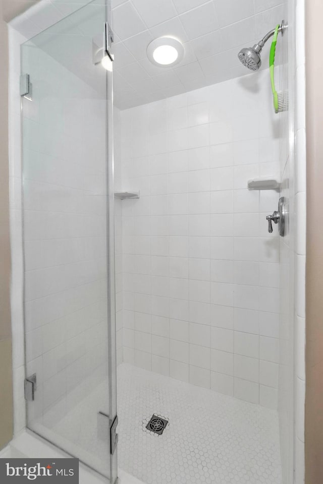 bathroom featuring walk in shower