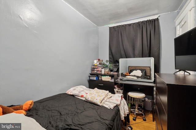 bedroom featuring light hardwood / wood-style floors