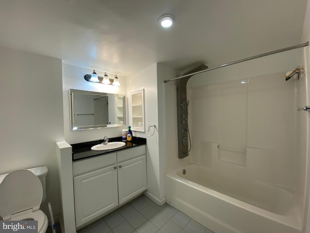 full bathroom with washtub / shower combination, vanity, toilet, and tile patterned flooring