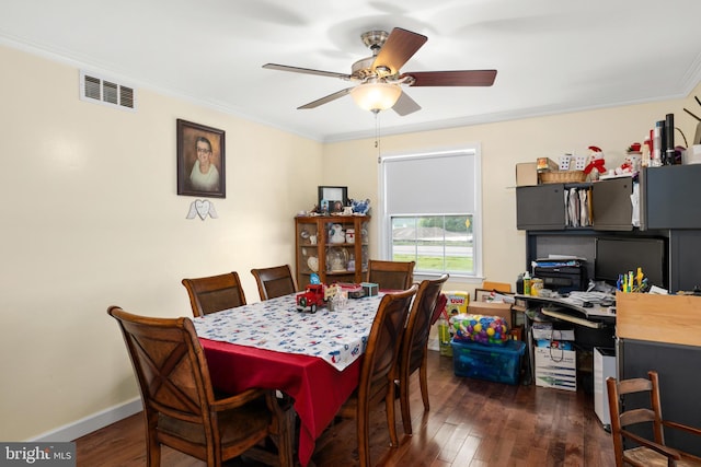 dining area featuring dark hardwood / wood-style flooring, ceiling fan, and ornamental molding