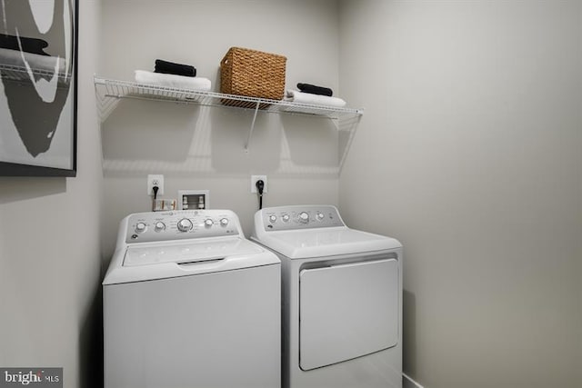 laundry room with washer and dryer