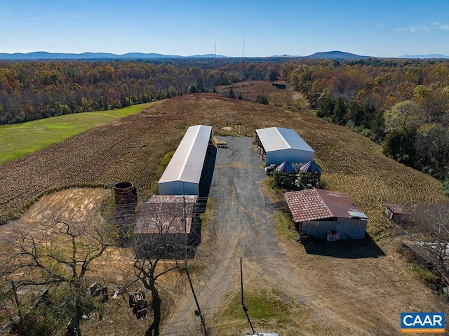 aerial view featuring a mountain view and a rural view