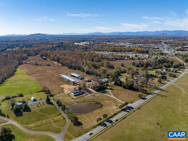 drone / aerial view featuring a mountain view