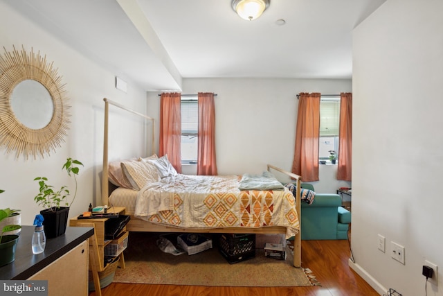 bedroom featuring hardwood / wood-style floors