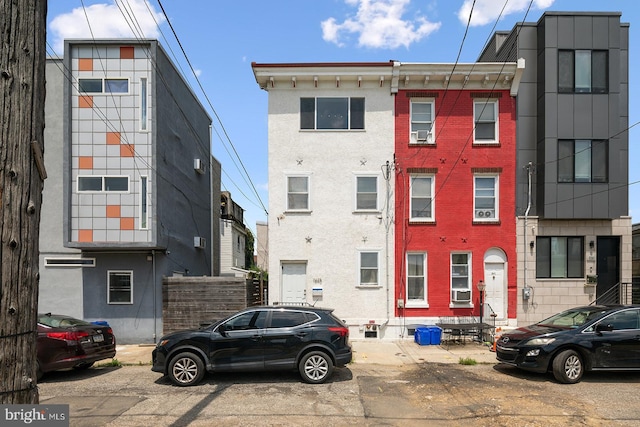 view of front of home featuring cooling unit