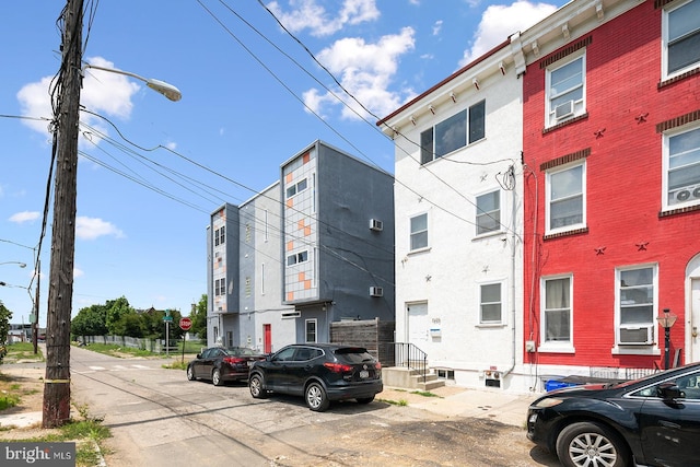 view of building exterior with cooling unit