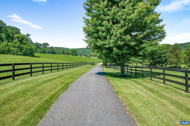 view of road featuring a rural view